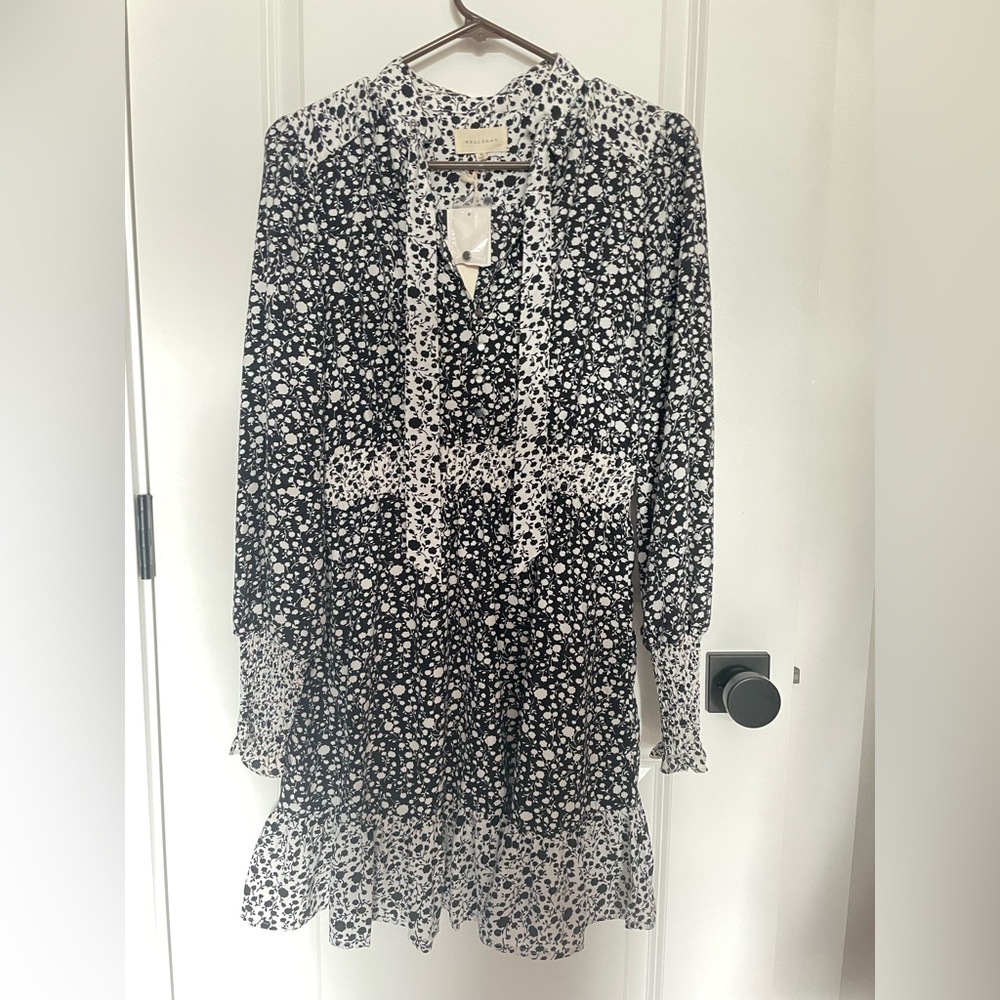 Tie-neck, black and white blouse. NWT